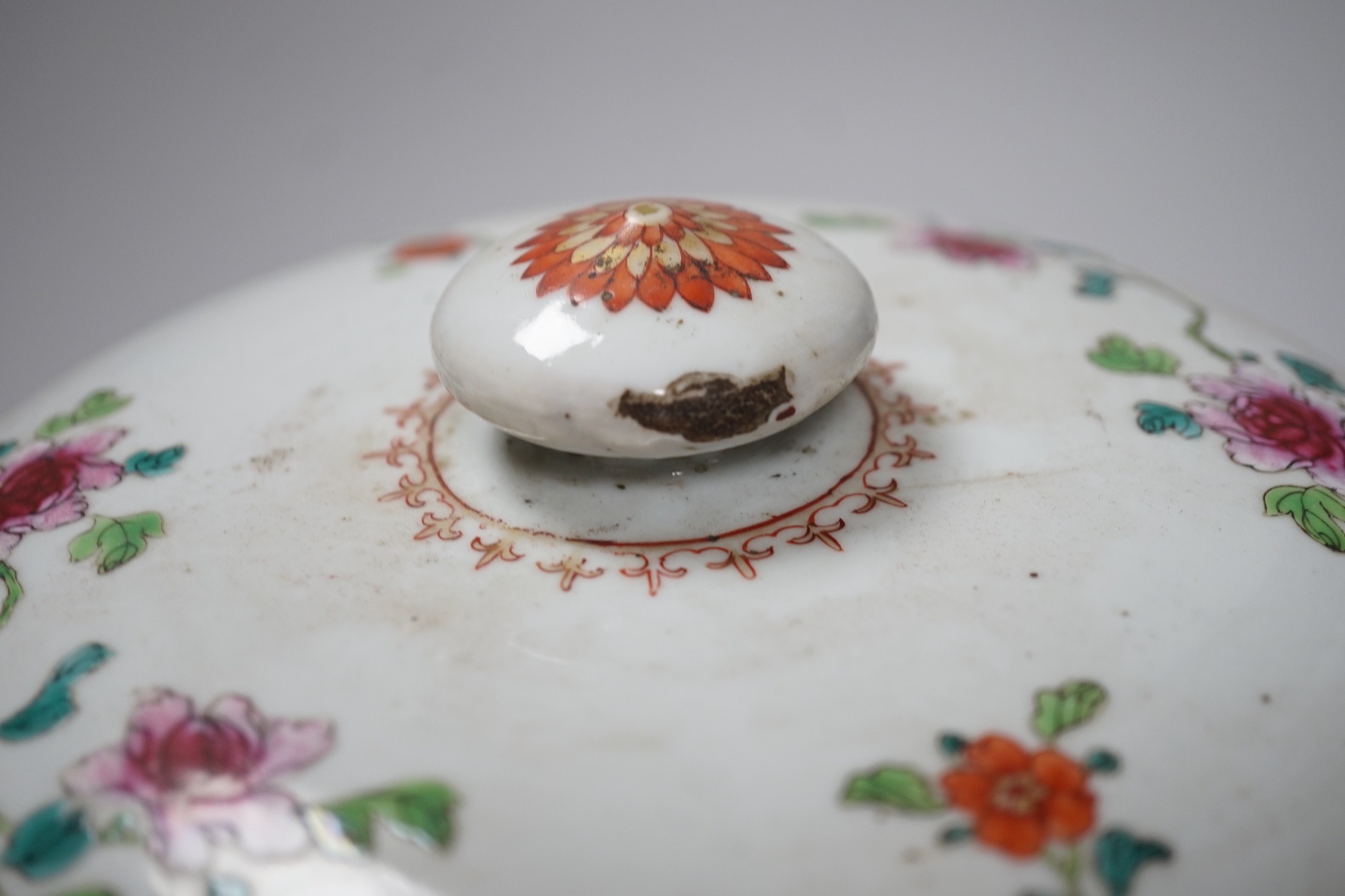 A Chinese famille rose ‘garden’ tureen and cover, Qianlong period, 19cms high